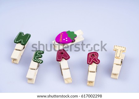 Wooden clips with some of meaning word.