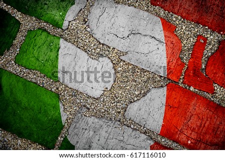 Italian state flag in grunge style is put on brickwork