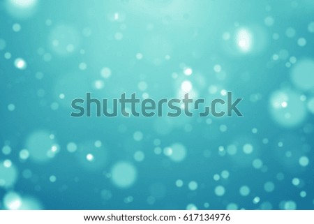 cyan bokeh lights defocused. abstract background or texture. 
