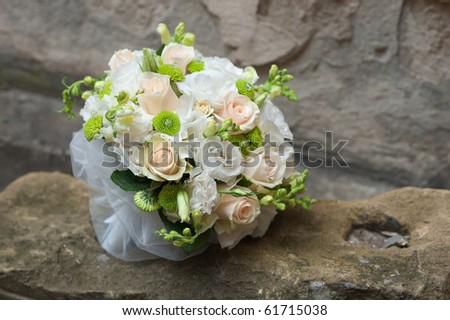 bridal bouquet on stone background