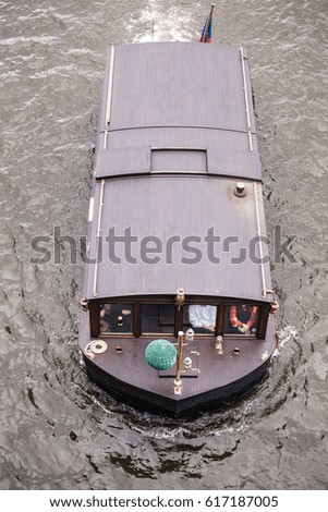 Wooden Tourist boat on the river, aerial view