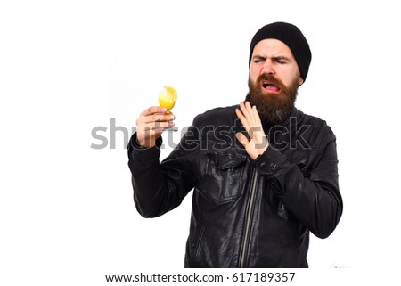 Bearded man, long beard. Brutal caucasian dissatisfied hipster with moustache holding glass of alcoholic beverage or shot in rock black style isolated on white studio background