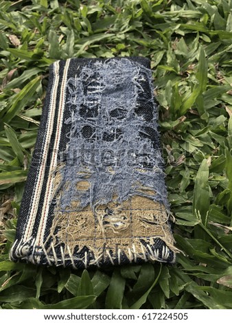 Cell phone case Designed with old blue and blue denim design. Vacant grassland