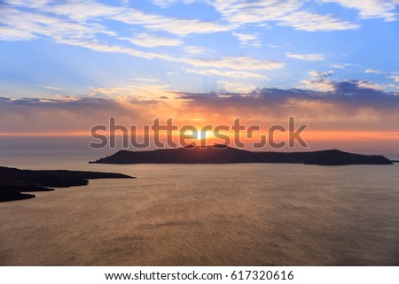 Beautiful sunset over Aegean sea at Santorini island Greece