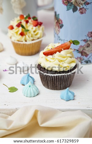 Chocolate cupcake with strawberry and  cream cheese 