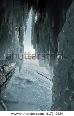 View from the icy grotto on the island Ogoy, Small Sea, Lake Baikal in winter, Russia