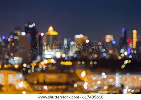 Abstract blurred bokeh light city office building with twilight sky background
