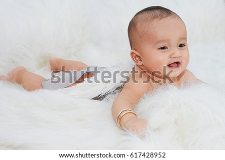 Baby with white wings