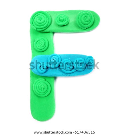 Plasticine letter F. Color plasticine alphabet, isolated.