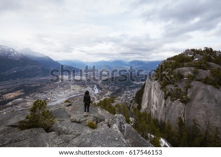 Beautiful view of Squamish City from the top of Chief Mountain. Picture taken in British Columbia, Canada, during a cloudy evening.
