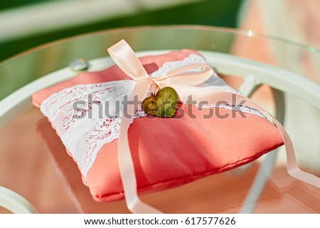 Wedding decor cushion for rings in coral style