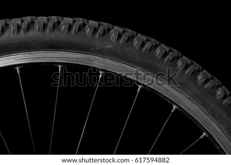 Sector of a bicycle wheel on a black background
