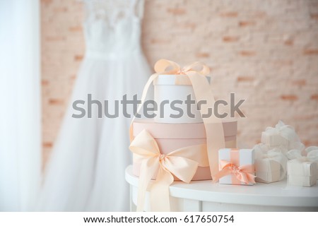 Table with gift boxes for wedding day Royalty-Free Stock Photo #617650754