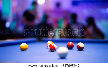 Blue Pool table with balls Royalty-Free Stock Photo #617695949