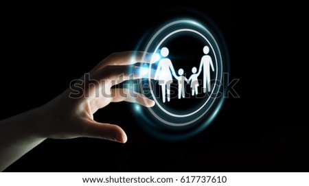 Businesswoman on blurred background holding family interface in his hand 3D rendering