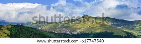 Panoramic view of Papusa Peak in Parang Mountains seen from Ranca sky resort  , Romania