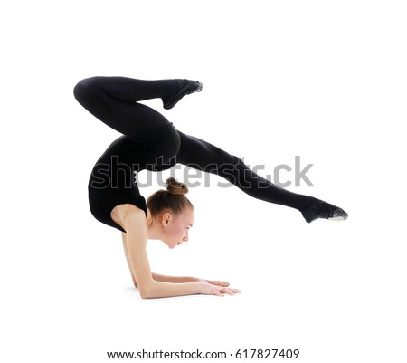 Young girl doing gymnastics on white background
