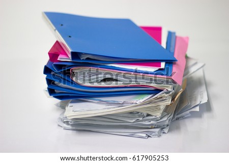 file folder and Stack of business report paper file 