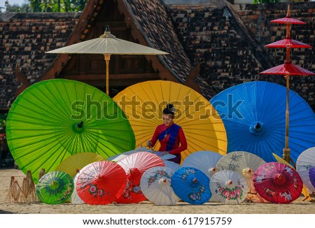 Thai Woman Traditional Costume Of Thailand painting umbrella,chiang-mai 