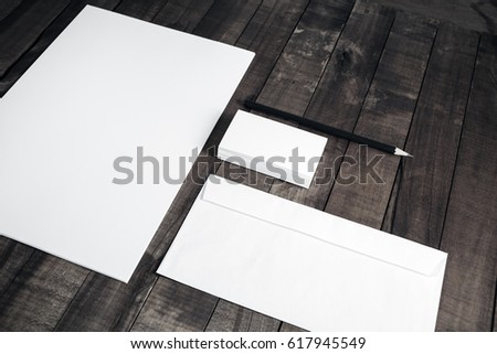 Photo of blank corporate identity. Stationery set. Branding mockup. Sheet of paper, letterhead, business cards, envelope and pencil.