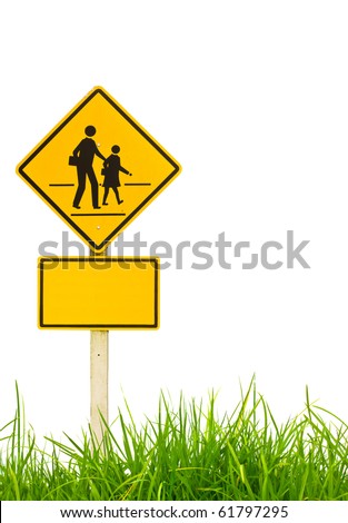 Traffic sign (School warning sign)  on grass