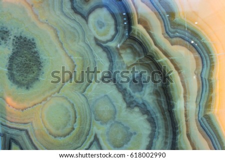 Gold and white patterned structure of dark gray marble texture for design close-up