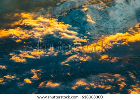 Sunset clouds, view from above air plane window