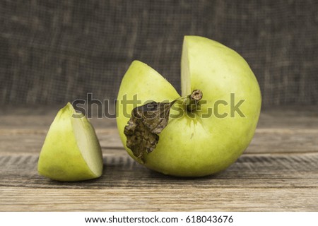 green apple on wood background