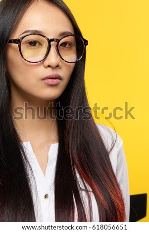 Asian woman with glasses