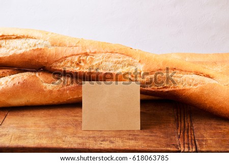Freshly baked baguettes with a price tag