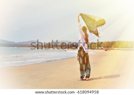 Blond girl relaxing on Agonda beach of South Goa, India