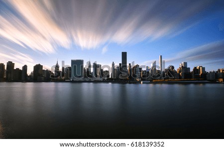 Long exposure of Midtown Manhattan, New York standing from Long Island City, Queens.