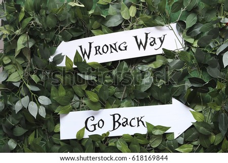 Right and wrong signs (Alice in Wonderland)
