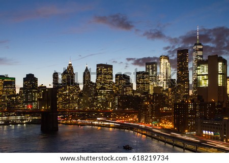 Night Lights of the New York City downtown skyline at dusk in Manhattan NYC