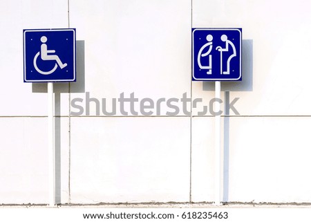 Handicap,pregnant and old people Reserved Parking Sign on white wall background.