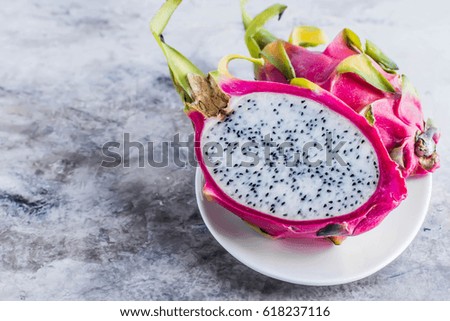 Dragon Fruit on marble gray table background. Asian fruit food concept