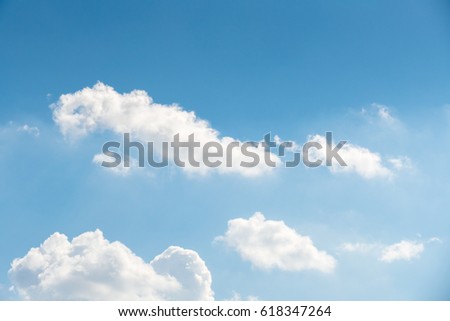 BLue sky and White cloud: clear blue sky with plain white cloud with space for text, Blue sky and cloud. Royalty-Free Stock Photo #618347264