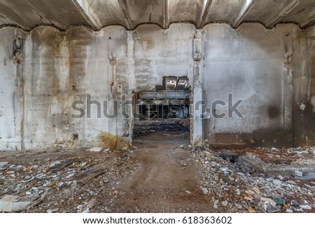 Interior of old factory buildings destroyed. Ruins of industrial enterprise abandoned.