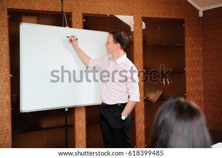 Business people in office holding a conference and discussing strategies