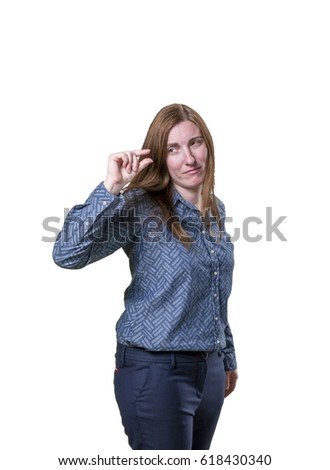 Pretty business woman doing tiny sign over white background.