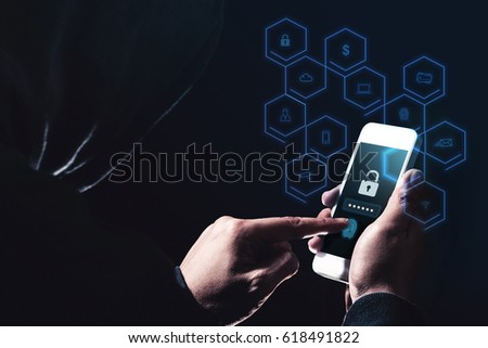 hack mobile phone data and phishing with malware.hoodie hacker hack security with diagram features icon and thief personal information.cyber crime concept Royalty-Free Stock Photo #618491822