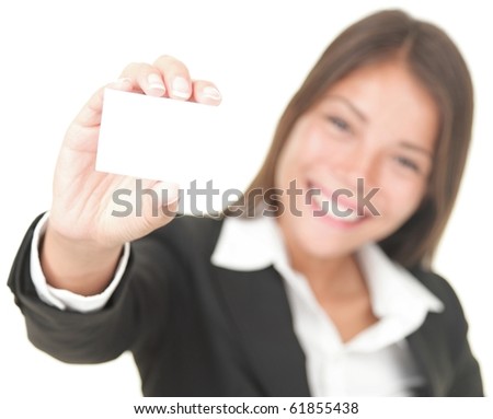 Business card businesswoman in suit. Woman in her 20s showing blank business card sign isolated on white background. Focus on business card