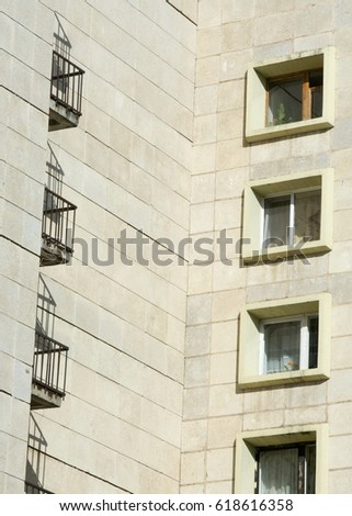 Texture, pattern, background. Windows of reinforced concrete buildings, urban landscape