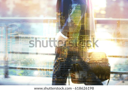 Businessman in suits walking in the City against of sunset. Business and modern life concept. Multiple exposure image.