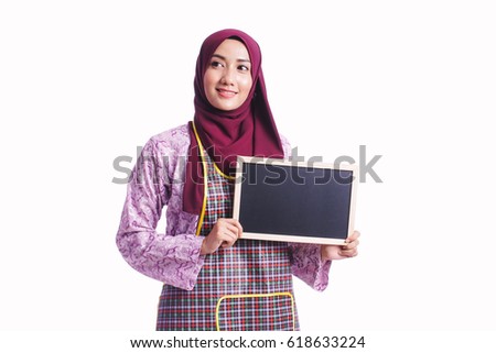  Beautiful woman wear an apron standing and hold a blank blackboard with different body language and expression isolated on white background - kitchen,cleaning, maid and service concept