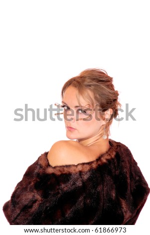 Beautiful  woman in fur jacket - isolated over a white background