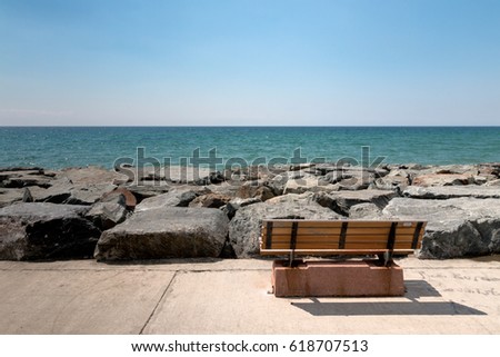 Open air and an empty wooden beach