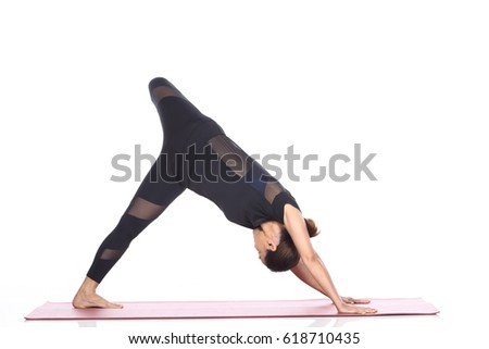 Asian Woman Yoga Teacher Instructor demonstrate each pose of lesson on matte, black dress suite leotard fashion legging, full length, studio lighting white background isolated