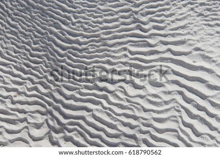 Close-up of wavy limestone texture of thermal terrace in Pamukkale, Turkey