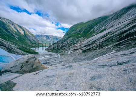 Nigardsbreen is a glacier arm of the large Jostedalsbreen glacier. Nigardsbreen lies about 30 kilometres north of the village of Gaupne in the Jostedalen valley, Luster, Sogn og Fjordane county Royalty-Free Stock Photo #618792773